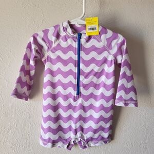 NWT Primary One-Piece Rash Guard in Lavender Waves size 6-12m